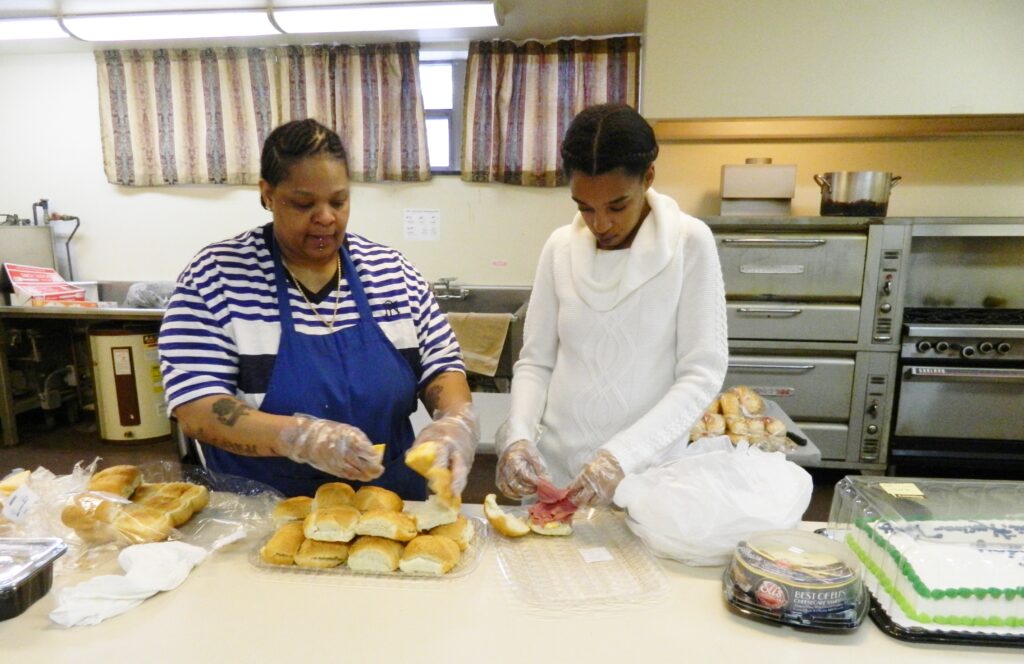 Grace UCC Members preparing food for after service