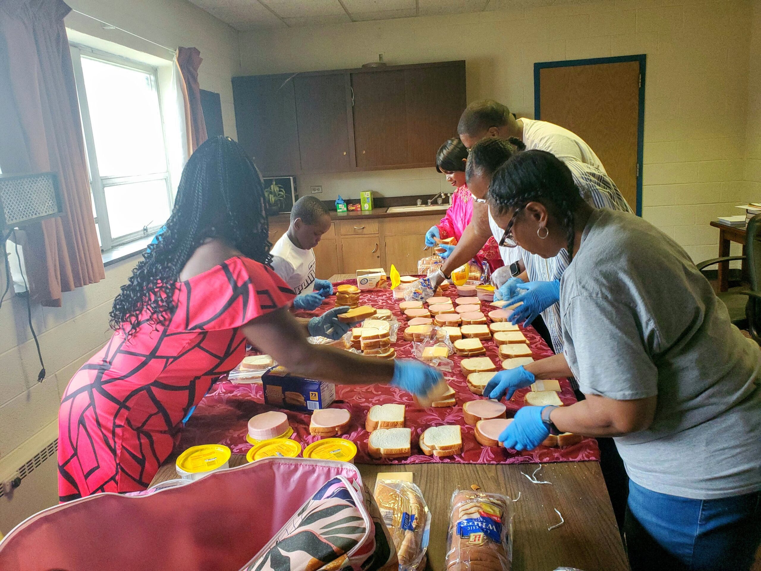 Members of Grace UCC making sandwiches for the homeless